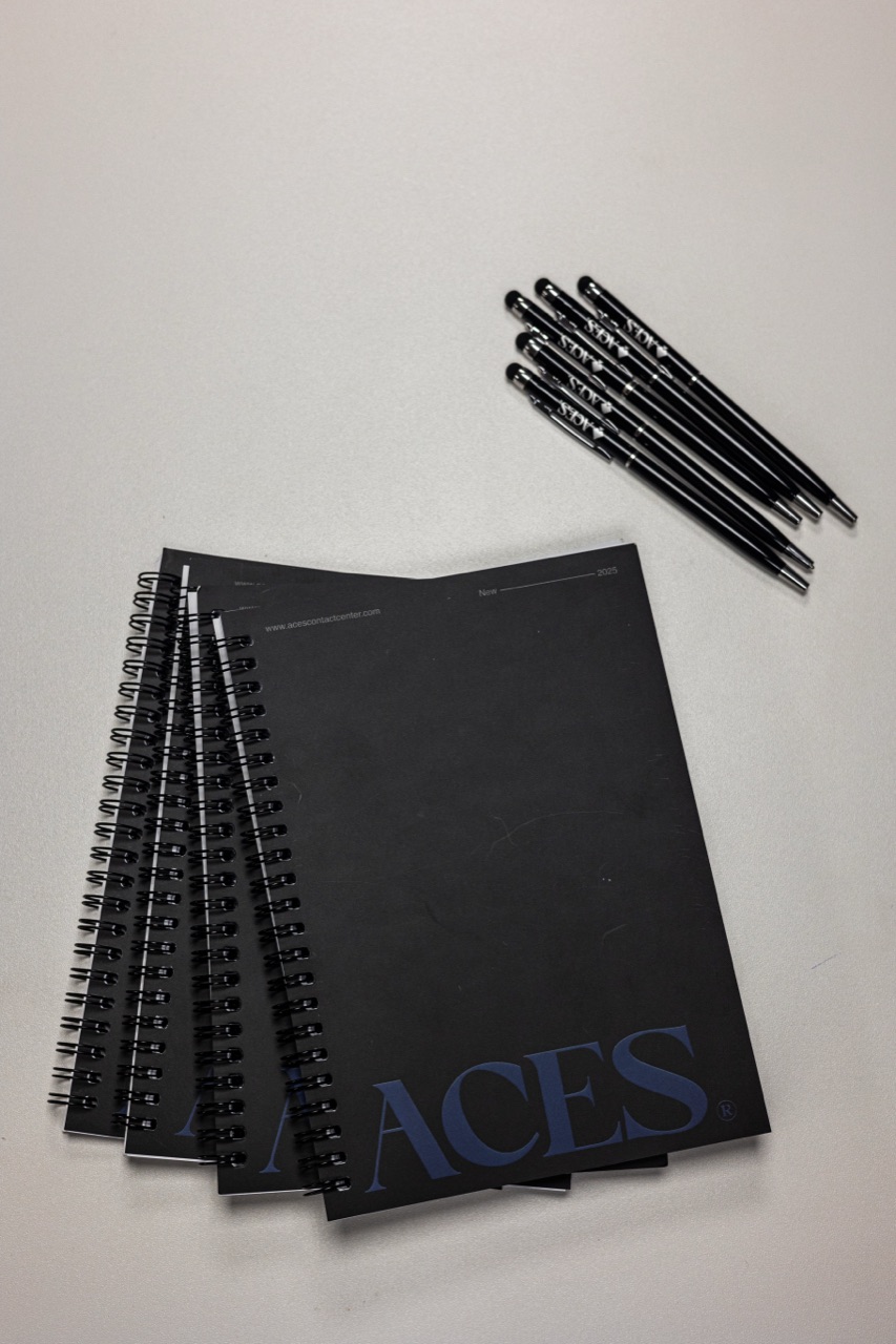 Branded ACES notebooks and pens